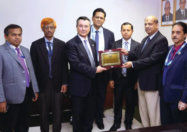 Mr. Santiago Gutierrez, President, WITSA hands over WITSA Award to DIU.